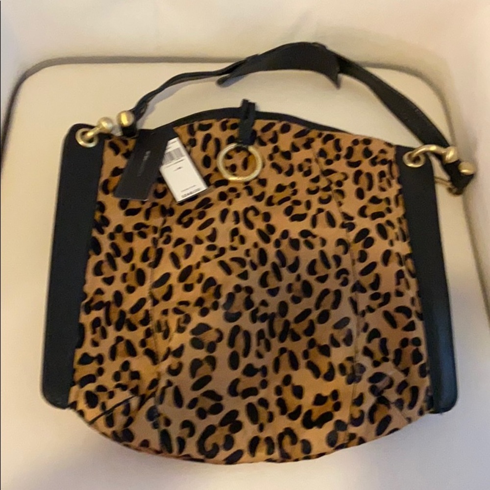 BCBGMAXAZRIA Cow hide and black leather handbag